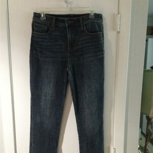 Chicos girlfriend Denim slim ankle with gold detail at bottom.